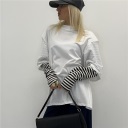 maglia con manica doppio strato layered